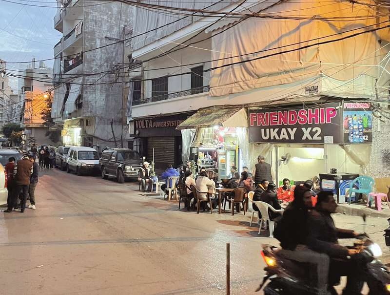 Shopfronts and cafe chairs on the street