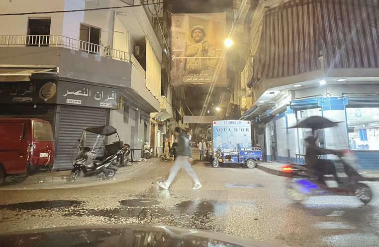 A wet Beirut street at night